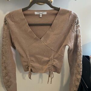 Short waist sweater
